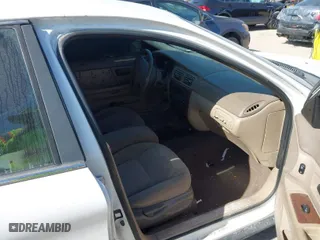 2003 Mercury Sable GS with VIN 1MEFM50U33A629599, listed as a IAAI auction lot 41579245 with 128,198 mi miles. Bid and sale history available at carsss.com. Image 5.