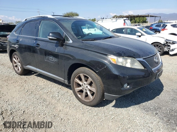 2011 Lexus RX 350 with VIN 2T2BK1BA7BC118064, listed as a Copart auction lot 65592965 with 129,497 mi miles and Salvage title. Bid and sale history available at DreamBid. Image 4.
