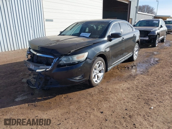 2011 Ford Taurus SEL with VIN 1FAHP2EW1BG177504, listed as a IAAI auction lot 41578564 with 243,855 mi miles. Bid and sale history available at carsss.com. Image 18.