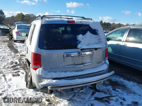 2015 Honda Pilot SE with VIN 5FNYF4H33FB064910, listed as a IAAI auction lot 41357315 with 115,879 mi miles and . Bid and sale history available at DreamBid. Image 16.