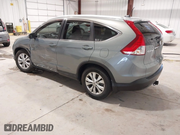 2012 Honda CR-V EX-L with VIN JHLRM4H70CC020419, listed as a IAAI auction lot 41814998 with 99,777 mi miles. Bid and sale history available at carsss.com. Image 3.