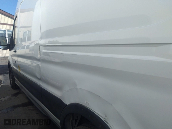 2019 Ford Transit with VIN 1FTYE2CM9KKB09353, listed as a IAAI auction lot 38121359 with 131,124 mi miles and . Bid and sale history available at DreamBid. Image 14.