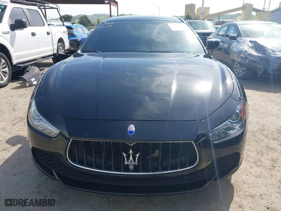 2015 Maserati Ghibli with VIN ZAM57XSA9F1146055, listed as a IAAI auction lot 41814633 with 88,783 mi miles. Bid and sale history available at carsss.com. Image 13.