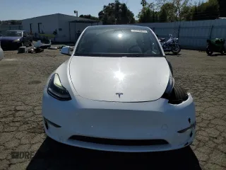 2021 Tesla Model Y Performance z VIN 5YJYGDEF2MF277467, wystawiony jako Copart lot #52410275 z przebiegiem 57 116 mil mil oraz Szkoda całkowita • Salvage title. Historia ofert i sprzedaży dostępna na DreamBid. Obrazek 5.