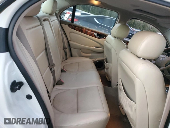 2004 Jaguar XJ with VIN SAJWA71C14SG16264, listed as a Copart auction lot 83251554 with 267,493 mi miles and Salvage Title. Bid and sale history available at carsss.com. Image 10.