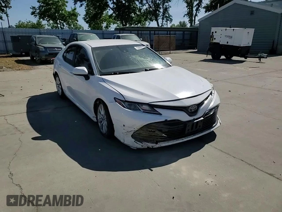 2018 Toyota Camry LE с VIN 4T1B11HK5JU073663, выставлен на аукционе Copart как лот 55656575 с пробегом 100 578 миль миль и Списание • Salvage title. История ставок и продаж доступна на DreamBid. Изображение 13.