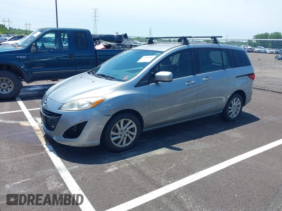 2012 Mazda 5 Sport z VIN JM1CW2BL1C0112647, wystawiony jako IAAI lot #42508246 z przebiegiem 170 765 mil mil oraz . Historia ofert i sprzedaży dostępna na DreamBid. Obrazek 2.