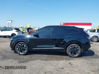 2023 Kia Sportage SX-Prestige z VIN 5XYK53AF2PG066651, wystawiony jako IAAI lot #41984627 z przebiegiem 81 298 mil mil oraz . Historia ofert i sprzedaży dostępna na DreamBid. Obrazek 14.