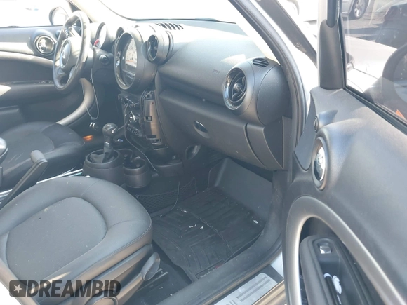 2013 MINI Countryman with VIN WMWZB3C59DWM09740, listed as a IAAI auction lot 41648192 with 145,915 mi miles and . Bid and sale history available at DreamBid. Image 5.