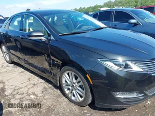 2014 Lincoln MKZ Hybrid with VIN 3LN6L2LU4ER811119, listed as a IAAI auction lot 42190415 with 98,898 mi miles and . Bid and sale history available at DreamBid. Image 6.