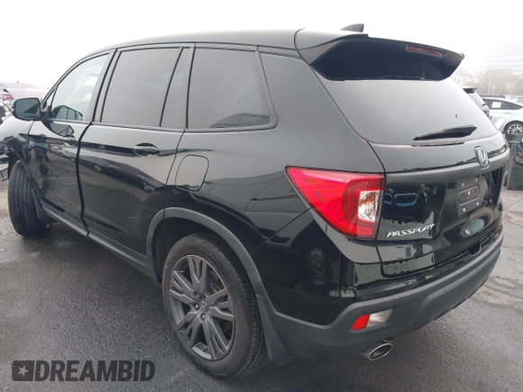 2021 Honda Passport EX-L with VIN 5FNYF7H5XMB013923, listed as a IAAI auction lot 41669295 with 42,969 mi miles. Bid and sale history available at carsss.com. Image 3.