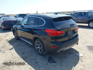 2017 BMW X1 sDrive28i z VIN WBXHU7C31H5H33748, wystawiony jako IAAI lot #42003198 z przebiegiem 71 274 mil mil oraz . Historia ofert i sprzedaży dostępna na DreamBid. Obrazek 3.