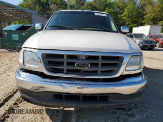 2001 Ford F-150 XLT with VIN 1FTRW07W11KB44405, listed as a Copart auction lot 53560595 with 272,881 mi miles and Salvage title. Bid and sale history available at DreamBid. Image 5.