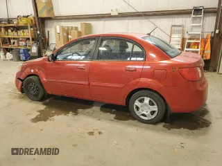 2010 Kia Rio with VIN KNADH4B39A6691792, listed as a Copart auction lot 80043064 with 161,139 mi miles and Salvage Title. Bid and sale history available at DreamBid. Image 2.