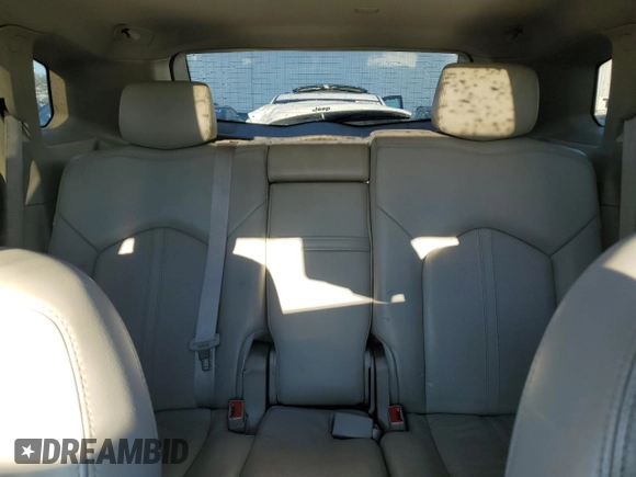 2014 Cadillac SRX Premium Collection z VIN 3GYFNGE34ES687663, wystawiony jako Copart lot #85854534 z przebiegiem 193 653 mil mil oraz Szkody całkowita. Historia ofert i sprzedaży dostępna na DreamBid. Obrazek 10.