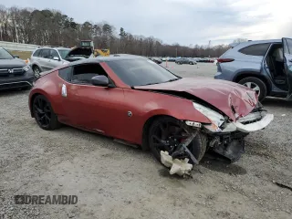 2014 Nissan 370Z Nismo with VIN JN1AZ4EH4EM631174, listed as a Copart auction lot 84396654 with Not Provided miles and Salvage Title. Bid and sale history available at DreamBid. Image 4.
