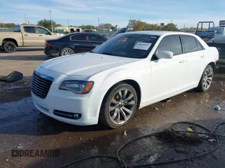 2014 Chrysler 300 with VIN 2C3CCABG9EH286541, listed as a IAAI auction lot 40828693 with 143,343 mi miles. Bid and sale history available at carsss.com. Image 17.