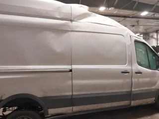 2023 Ford Transit Cargo with VIN 1FTBW3X87PKB39433, listed as a IAAI auction lot 41151064 with Not provided miles and . Bid and sale history available at DreamBid. Image 13.