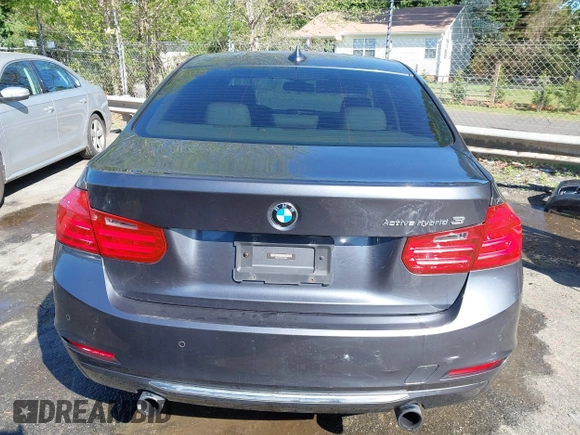 2013 BMW 3 Series ActiveHybrid 3 with VIN WBA3F9C5XDF484346, listed as a IAAI auction lot 41998341 with 145,271 mi miles. Bid and sale history available at carsss.com. Image 16.