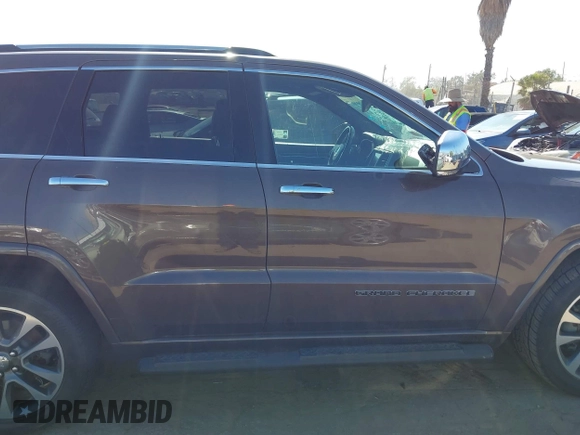 2017 Jeep Grand Cherokee Overland z VIN 1C4RJECG0HC960178, wystawiony jako IAAI lot #42315844 z przebiegiem 63 271 mil mil oraz . Historia ofert i sprzedaży dostępna na DreamBid. Obrazek 13.
