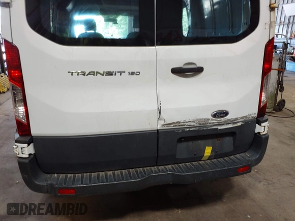 2015 Ford Transit Cargo with VIN 1FTNE1ZM8FKB17731, listed as a IAAI auction lot 42351353 with 74,489 mi miles and . Bid and sale history available at DreamBid. Image 6.