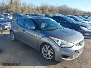 2012 Hyundai Veloster w/Gray Int with VIN KMHTC6AD8CU027710, listed as a IAAI auction lot 41758972 with 126,490 mi miles. Bid and sale history available at carsss.com. Image 1.