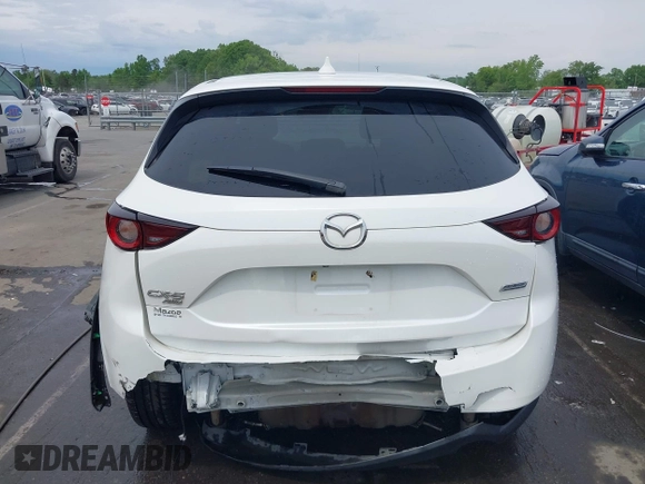 2018 Mazda CX-5 Touring with VIN JM3KFBCMXJ0366008, listed as a IAAI auction lot 42079989 with 153,868 mi miles and . Bid and sale history available at DreamBid. Image 16.
