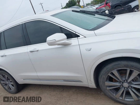 2020 Cadillac XT6 FWD Premium Luxury with VIN 1GYKPCRS2LZ101061, listed as a IAAI auction lot 42113360 with Not provided miles and . Bid and sale history available at DreamBid. Image 13.