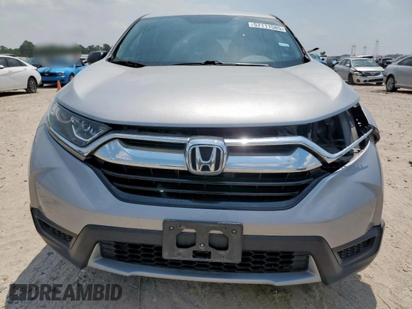2019 Honda CR-V LX z VIN 2HKRW5H32KH406837, wystawiony jako Copart lot #57111585 z przebiegiem 123 047 mil mil oraz Szkoda całkowita • Salvage title. Historia ofert i sprzedaży dostępna na DreamBid. Obrazek 5.