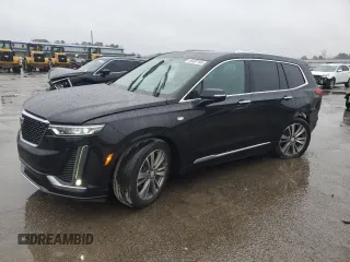 2021 Cadillac XT6 Premium Luxury z VIN 1GYKPDRS3MZ117552, wystawiony jako Copart lot #46487165 z przebiegiem 50 349 mil mil oraz Tytuł czysty. Historia ofert i sprzedaży dostępna na DreamBid. Obrazek 1.