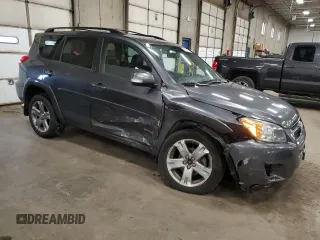 2010 Toyota RAV4 Sport with VIN JTMRK4DV8A5085818, listed as a Copart auction lot 51799295 with 115,109 mi miles and Salvage title. Bid and sale history available at DreamBid. Image 4.