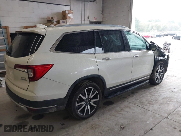2019 Honda Pilot Elite with VIN 5FNYF6H08KB054725, listed as a IAAI auction lot 40496860 with 91,284 mi miles and . Bid and sale history available at DreamBid. Image 4.