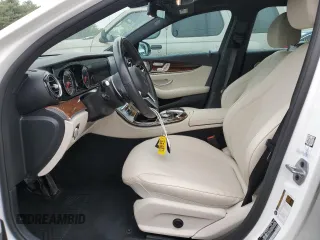 2019 Mercedes-Benz E 300 with VIN WDDZF4KB9KA520910, listed as a Copart auction lot 54697765 with 69,324 mi miles and Salvage title. Bid and sale history available at DreamBid. Image 7.