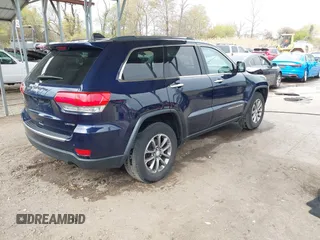 2014 Jeep Grand Cherokee Limited with VIN 1C4RJFBG4EC347208, listed as a IAAI auction lot 41982209 with 124,663 mi miles and . Bid and sale history available at DreamBid. Image 4.