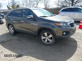 2013 Kia Sorento EX with VIN 5XYKU3A62DG373137, listed as a IAAI auction lot 41872724 with 177,387 mi miles. Bid and sale history available at carsss.com. Image 1.