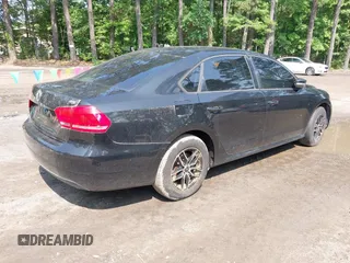 2014 Volkswagen Passat Wolfsburg Edition with VIN 1VWAT7A35EC056127, listed as a IAAI auction lot 42497467 with 111,443 mi miles and . Bid and sale history available at DreamBid. Image 4.