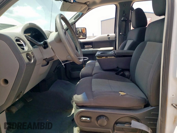 2006 Ford F-150 XLT with VIN 1FTPW12V26KD80614, listed as a Copart auction lot 58308615 with 159,508 mi miles and Salvage title. Bid and sale history available at DreamBid. Image 7.
