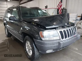 2003 Jeep Grand Cherokee Laredo z VIN 1J4GW48S23C520451, wystawiony jako IAAI lot #41974664 z przebiegiem 170 895 mil mil oraz . Historia ofert i sprzedaży dostępna na DreamBid. Obrazek 1.