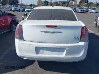 2014 Chrysler 300 S with VIN 2C3CCABG0EH235784, listed as a IAAI auction lot 41345692 with 109,920 mi miles and . Bid and sale history available at DreamBid. Image 16.