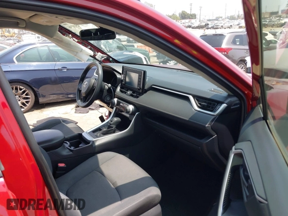 2019 Toyota RAV4 LE with VIN JTMK1RFV4KD025587, listed as a IAAI auction lot 42459046 with 73,852 mi miles and . Bid and sale history available at DreamBid. Image 5.