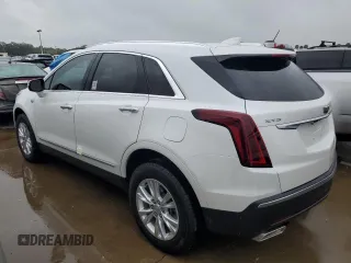2022 Cadillac XT5 FWD Luxury z VIN 1GYKNAR48NZ163921, wystawiony jako Copart lot #74507874 z przebiegiem 5 723 mil mil oraz Nie do naprawy • Non repairable. Historia ofert i sprzedaży dostępna na DreamBid. Obrazek 2.