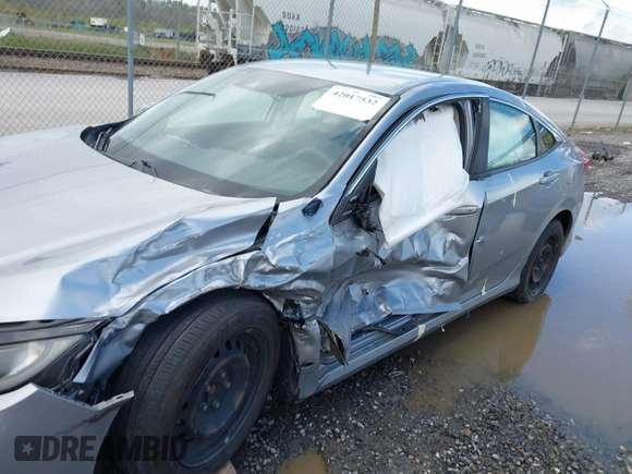 2019 Honda Civic LX with VIN 19XFC2F61KE009471, listed as a IAAI auction lot 42017532 with 81,134 mi miles and . Bid and sale history available at DreamBid. Image 6.