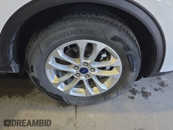 2020 Ford Escape SE with VIN 1FMCU9G63LUB82205, listed as a IAAI auction lot 42663574 with 91,305 mi miles and . Bid and sale history available at DreamBid. Image 5.