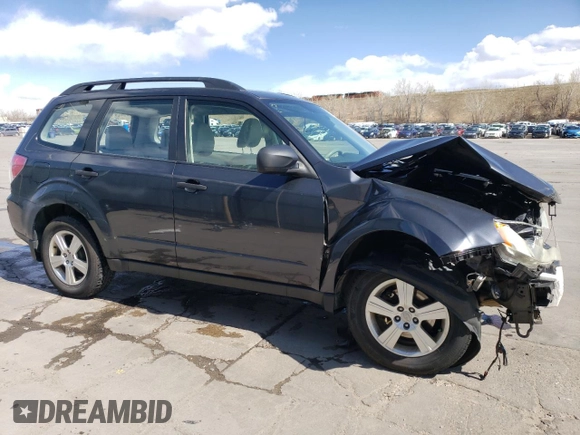 2012 Subaru Forester X with VIN JF2SHBBC3CH458241, listed as a Copart auction lot 51794985 with 183,226 mi miles and Salvage Title. Bid and sale history available at DreamBid. Image 4.