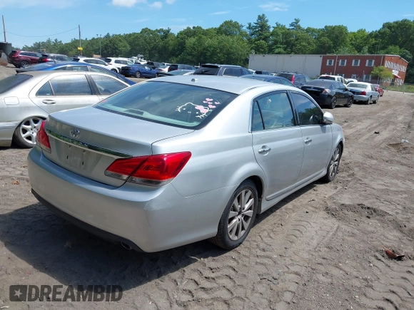2011 Toyota Avalon with VIN 4T1BK3DB6BU387869, listed as a IAAI auction lot 42762068 with 156,559 mi miles and . Bid and sale history available at DreamBid. Image 4.