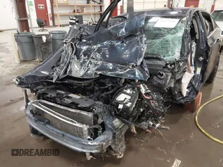 2014 Chevrolet Cruze 2LT z VIN 1G1PE5SB2E7120465, wystawiony jako IAAI lot #41672988 z przebiegiem Nie podano mil oraz . Historia ofert i sprzedaży dostępna na DreamBid. Obrazek 16.