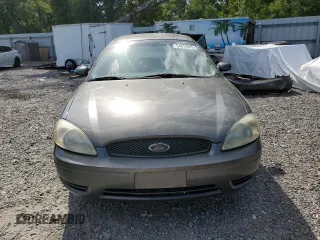 2004 Ford Taurus SE with VIN 1FAFP53U24A137741, listed as a Copart auction lot 54313915 with 92,739 mi miles and Salvage Title. Bid and sale history available at DreamBid. Image 5.
