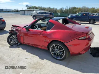 2020 Mazda MX-5 Miata Grand Touring z VIN JM1NDAM73L0412151, wystawiony jako Copart lot #47370245 z przebiegiem Nie podano mil oraz Nie do naprawy • Non repairable. Historia ofert i sprzedaży dostępna na DreamBid. Obrazek 2.
