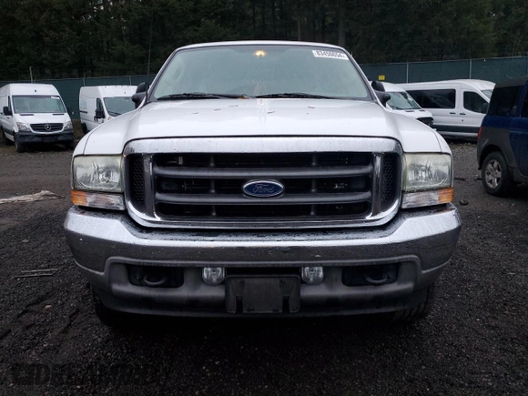 2003 Ford Super Duty F-250 XL with VIN 1FTNX21L63EC71321, listed as a Copart auction lot 83450654 with 112,486 mi miles and Salvage Title. Bid and sale history available at carsss.com. Image 5.