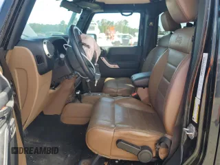 2012 Jeep Wrangler Unlimited Sahara with VIN 1C4HJWEG5CL205826, listed as a Copart auction lot 58222115 with 98,940 mi miles and Salvage title. Bid and sale history available at DreamBid. Image 7.
